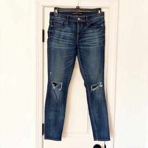Express mid rise legging jeans dark wash distressed holey jeans 8